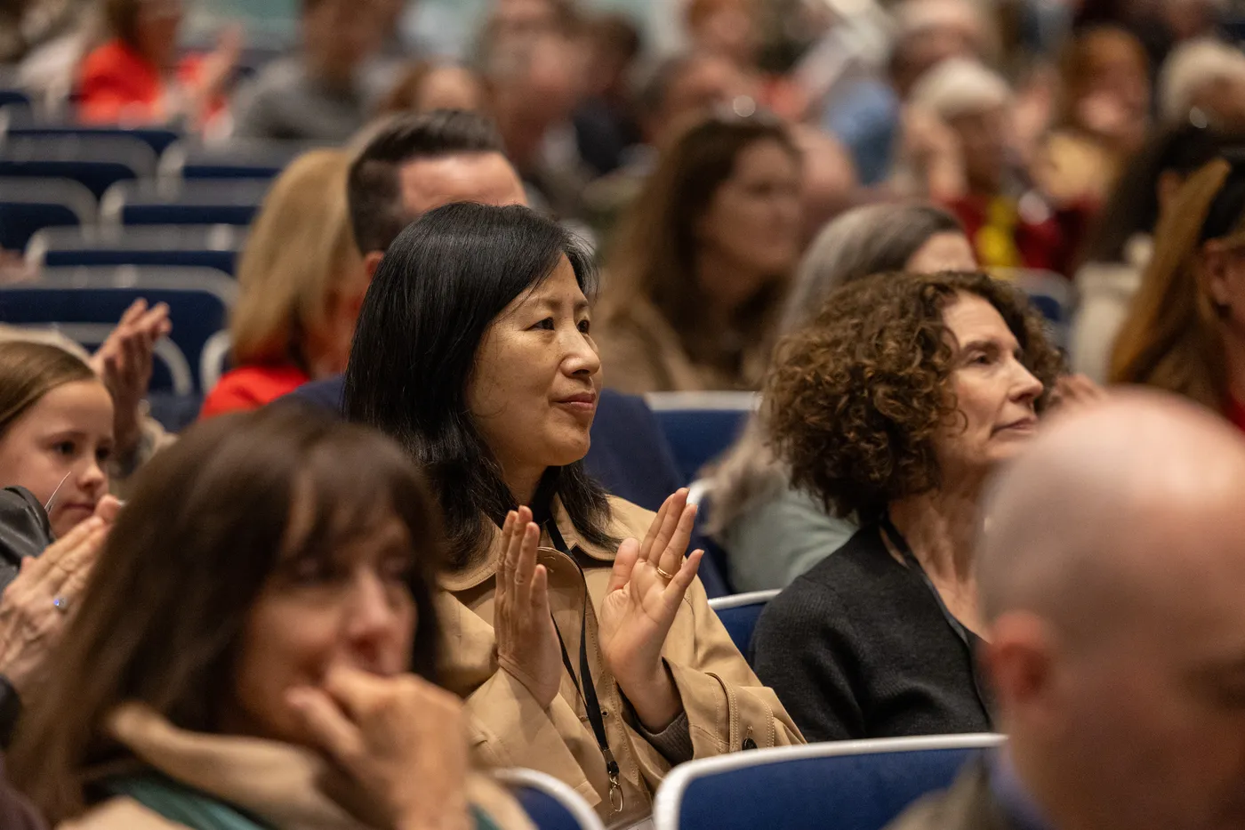 Attendees applaud in a full auditorium at the 2026 Fairfax County Republican Convention.